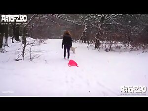 The girl gets busted in the snow by her sexy dog and then gets sucked by him like a slut